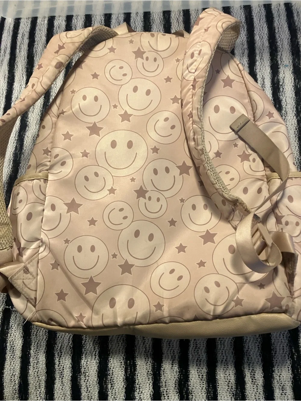 Madden NYC smiley faced back pack with gold hardware , beige & brown 9 pockets z